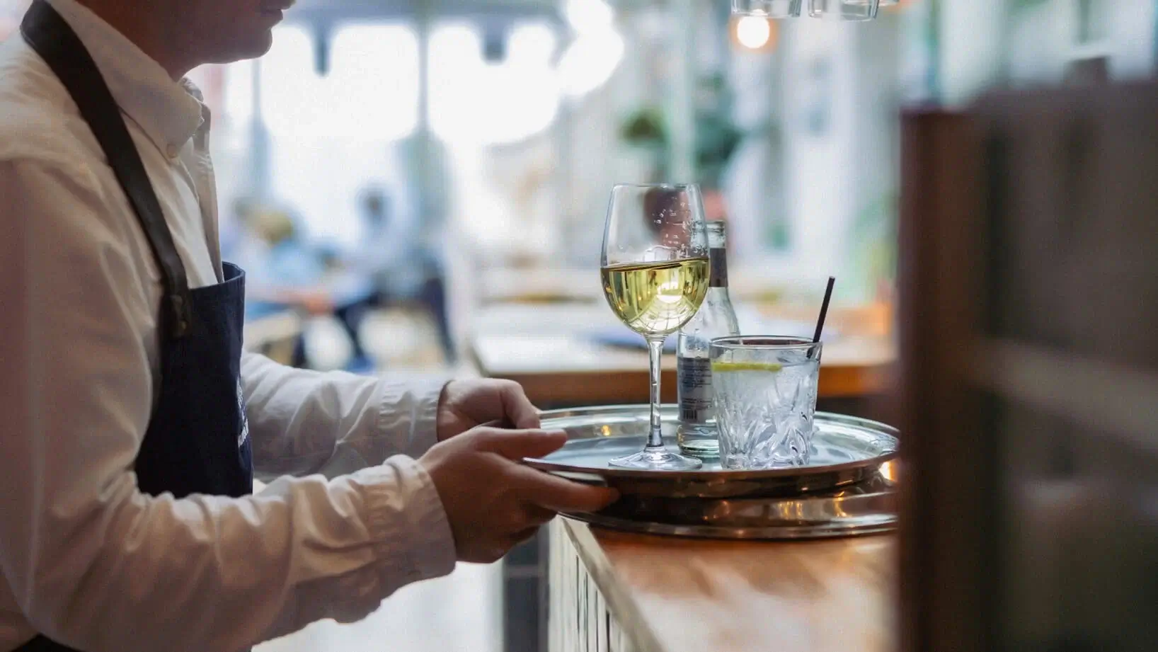 Serving drinks - a white wine and a G&T